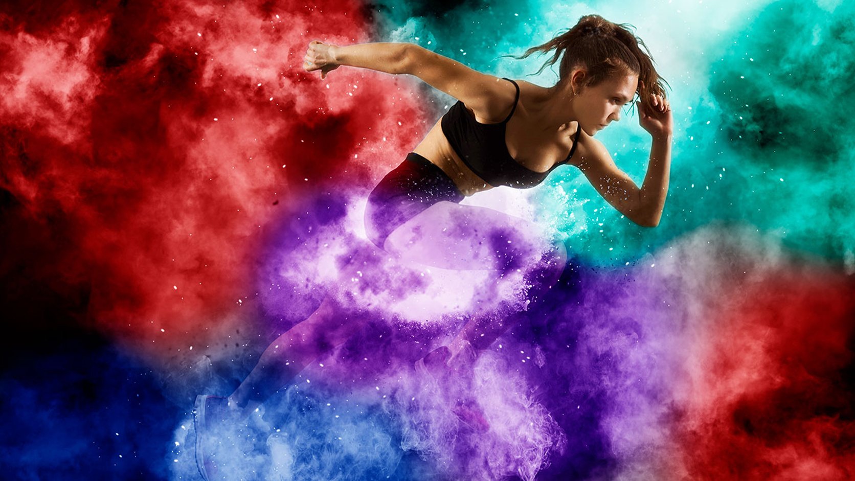 Woman runner surrounded by color poof clouds